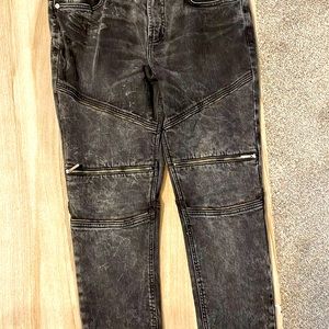 Young man, skinny jeans only used once